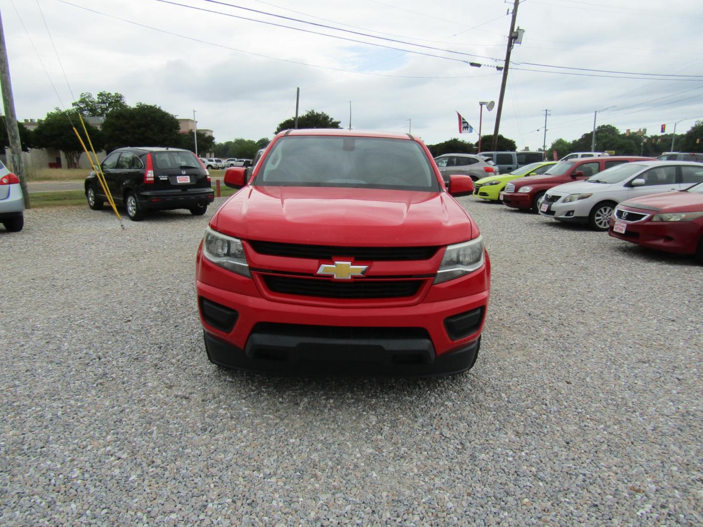 2017 Red /Gray Chevrolet Colorado Work Truck Ext. Cab 2WD (1GCHSBEA0H1) with an 2.5L L4 DOHC 16V GAS engine, 6A transmission, located at 15016 S Hwy 231, Midland City, AL, 36350, (334) 983-3001, 31.306210, -85.495277 - Photo#1